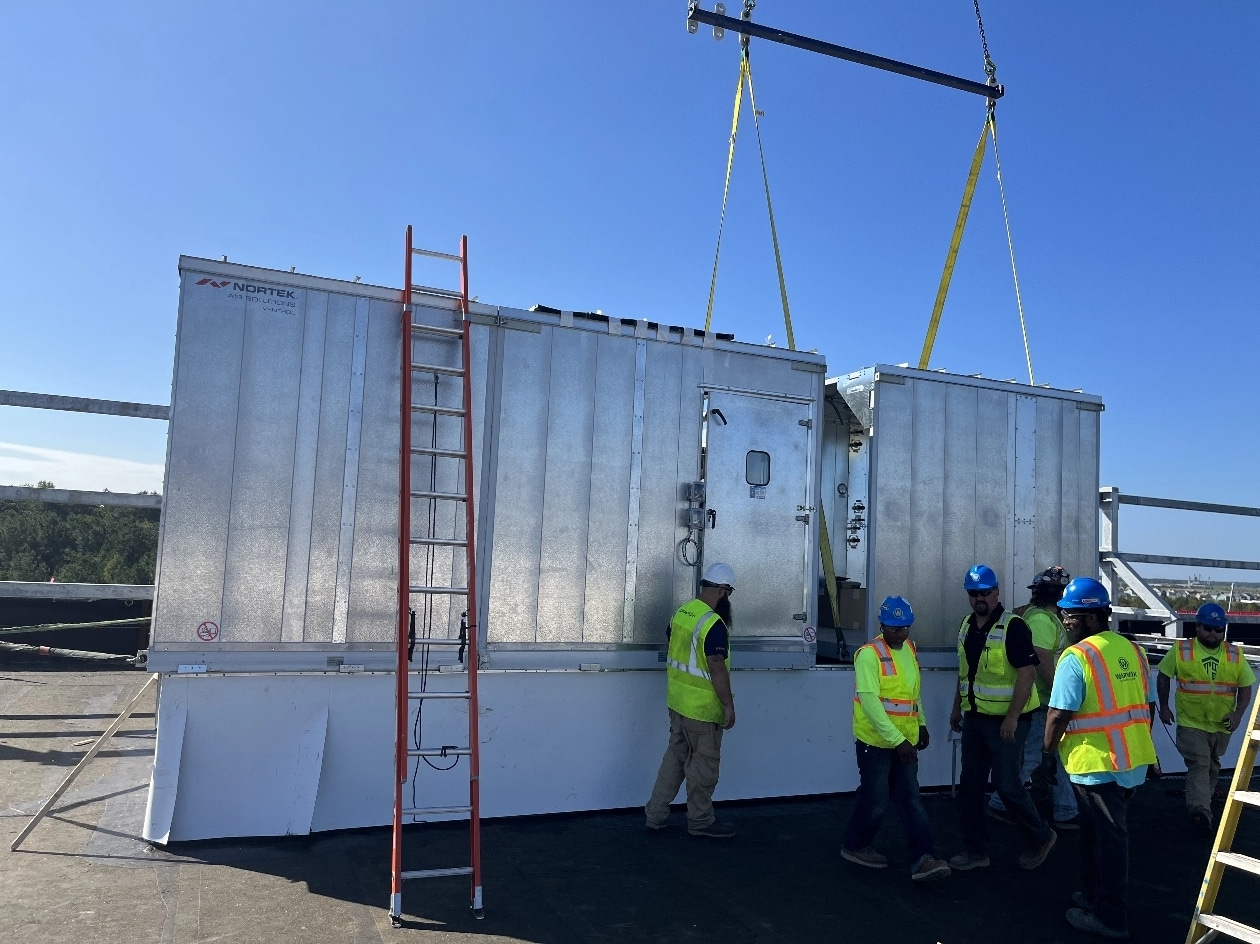 workers setting a system up