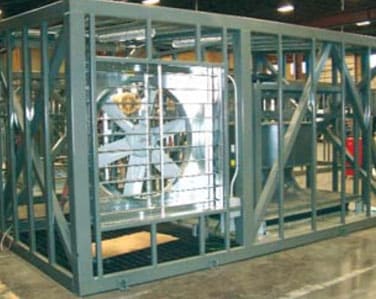 Top fan section with prop exhaust fan and vertical plenum supply fan. Fans, drives, power wiring, and controls were all factory-installed, minimizing required site work.